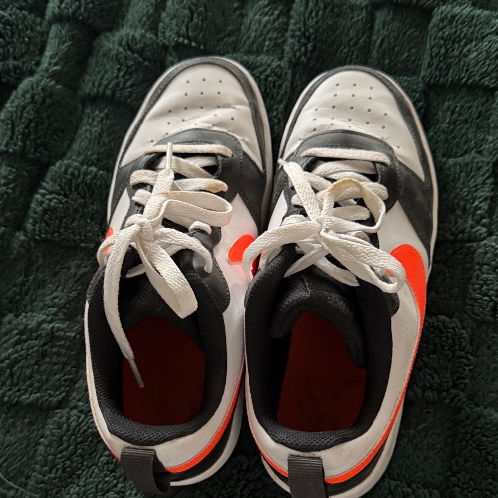 Nike Kids Sneakers in White, Black, and Orange